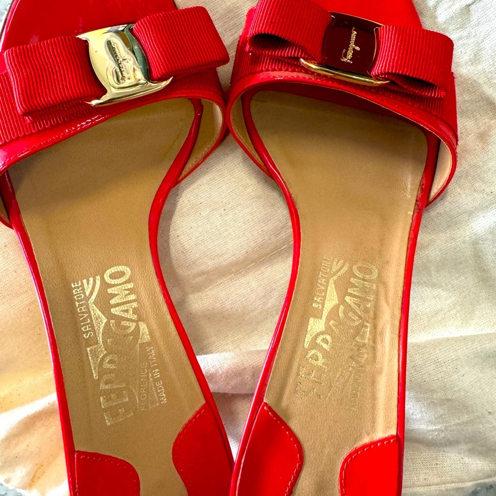 Ferragamo open toe red sandal with a tiny heel